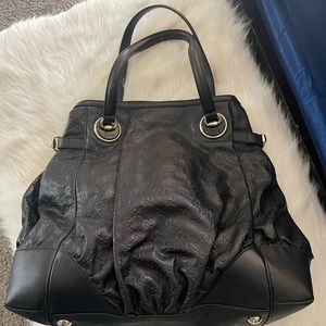 Gucci Guccissima large full moon leather tote.